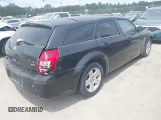 2005 Dodge Magnum SE with VIN 2D4FV48VX5H128545, listed as a IAAI auction lot 42098344 with Not Provided miles and . Bid and sale history available at carsss.com. Image 4.
