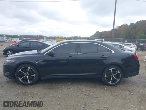 2015 Ford Taurus SHO with VIN 1FAHP2KT7FG148444, listed as a IAAI auction lot 40788614 with 121,533 mi miles and . Bid and sale history available at DreamBid. Image 14.