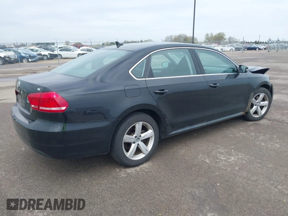 2013 Volkswagen Passat SE with VIN 1VWBP7A31DC017929, listed as a IAAI auction lot 42174320 with 169,596 mi miles and . Bid and sale history available at DreamBid. Image 4.