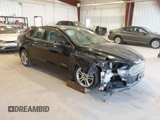 2016 Ford Fusion Titanium Hybrid with VIN 3FA6P0RU7GR127307, listed as a IAAI auction lot 41944427 with 128,076 mi miles. Bid and sale history available at carsss.com. Image 1.