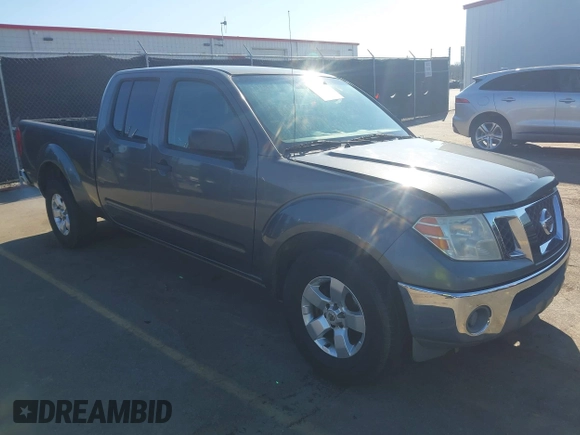 2009 Nissan Frontier LE with VIN 1N6AD09U79C402623, listed as a IAAI auction lot 41656385 with 286,777 mi miles and . Bid and sale history available at DreamBid. Image 1.