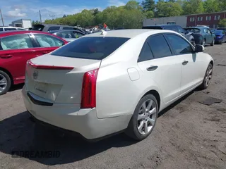 2013 Cadillac ATS with VIN 1G6AG5RX5D0178136, listed as a IAAI auction lot 42220395 with 147,066 mi miles and . Bid and sale history available at DreamBid. Image 4.