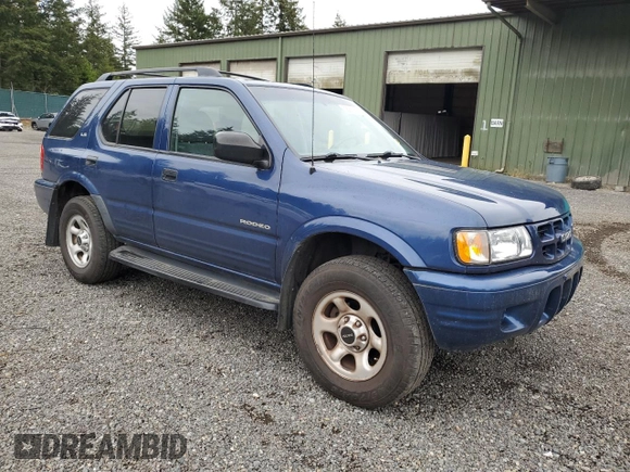 2002 Isuzu Rodeo S with VIN 4S2CK58W124301647, listed as a Copart auction lot 56973895 with 129,009 mi miles and Salvage title. Bid and sale history available at DreamBid. Image 4.