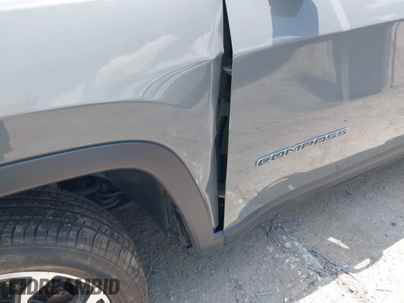 2023 Jeep Compass Limited с VIN 3C4NJDCN4PT523228, выставлен на аукционе IAAI как лот 42555447 с пробегом 57 684 миль миль и . История ставок и продаж доступна на DreamBid. Изображение 17.