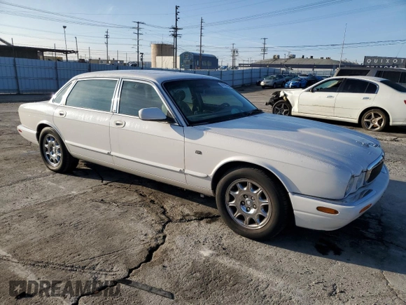 2001 Jaguar XJ with VIN SAJDA23C51LF35586, listed as a Copart auction lot 44105165 with 47,355 mi miles and Salvage title. Bid and sale history available at DreamBid. Image 4.