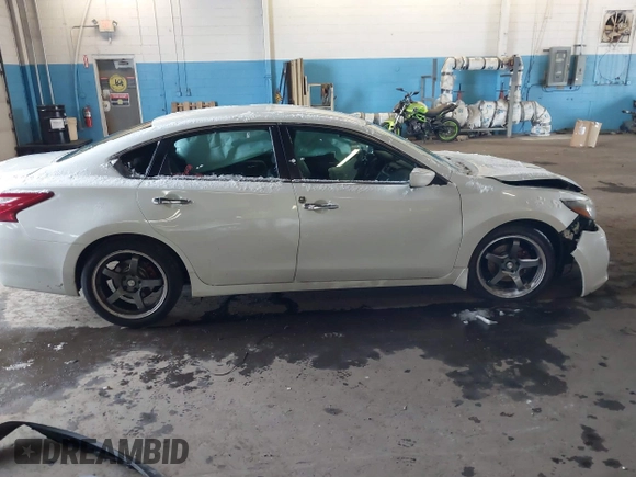 2016 Nissan Altima SR with VIN 1N4AL3AP1GC174425, listed as a IAAI auction lot 41177401 with 173,374 mi miles and . Bid and sale history available at DreamBid. Image 12.