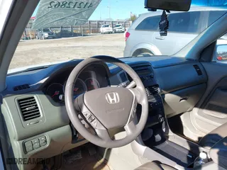 2006 Honda Pilot EX-L with VIN 5FNYF28526B006602, listed as a IAAI auction lot 41212862 with 239,648 mi miles. Bid and sale history available at carsss.com. Image 16.