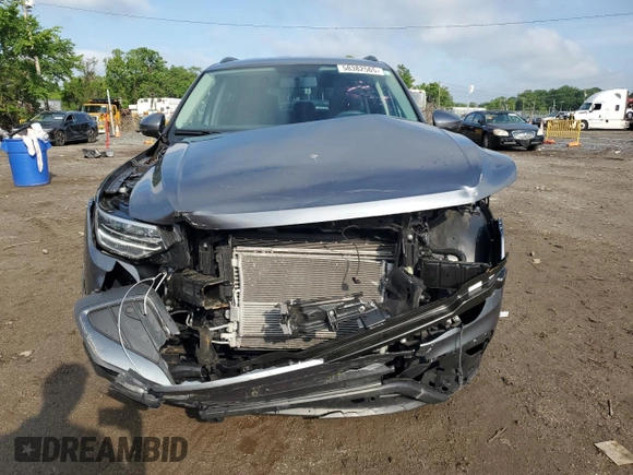 2022 Volkswagen Tiguan S with VIN 3VV0B7AX7NM173857, listed as a Copart auction lot 58382565 with 14,586 mi miles and Salvage title. Bid and sale history available at DreamBid. Image 5.