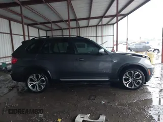 2011 BMW X5 50i with VIN 5UXZV8C59BL419527, listed as a IAAI auction lot 42173425 with 185,802 mi miles and . Bid and sale history available at DreamBid. Image 14.