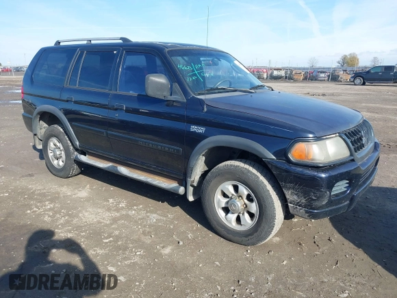 2002 Mitsubishi Montero ES z VIN JA4LS21H72J054989, wystawiony jako IAAI lot #41067504 z przebiegiem 335 479 mil mil oraz . Historia ofert i sprzedaży dostępna na DreamBid. Obrazek 1.