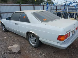 1990 Mercedes-Benz 560 with VIN WDBCA45E9LA549067, listed as a IAAI auction lot 41849642 with 124,516 mi miles and . Bid and sale history available at DreamBid. Image 3.
