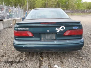 1995 Ford Taurus GL with VIN 1FALP52U8SA179395, listed as a Copart auction lot 53614265 with 71,082 mi miles and Salvage title. Bid and sale history available at DreamBid. Image 6.