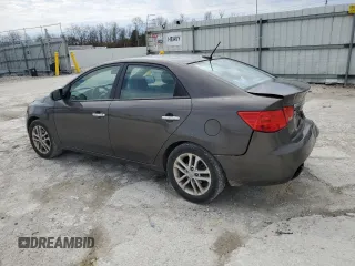 2012 Kia Forte EX with VIN KNAFU4A28C5527858, listed as a Copart auction lot 50952305 with 148,515 mi miles and Salvage Title. Bid and sale history available at carsss.com. Image 2.