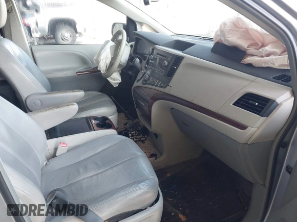 2013 Toyota Sienna XLE AAS with VIN 5TDYK3DC3DS297044, listed as a IAAI auction lot 42552470 with 143,947 mi miles and . Bid and sale history available at DreamBid. Image 5.