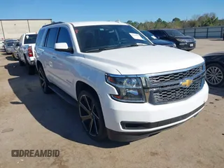 2015 Chevrolet Tahoe LS with VIN 1GNSCAKCXFR748554, listed as a IAAI auction lot 41765865 with 160,282 mi miles and . Bid and sale history available at DreamBid. Image 1.