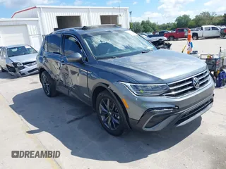 2023 Volkswagen Tiguan SE with VIN 3VVNB7AX5PM064693, listed as a IAAI auction lot 42033011 with 38,220 mi miles and . Bid and sale history available at DreamBid. Image 1.