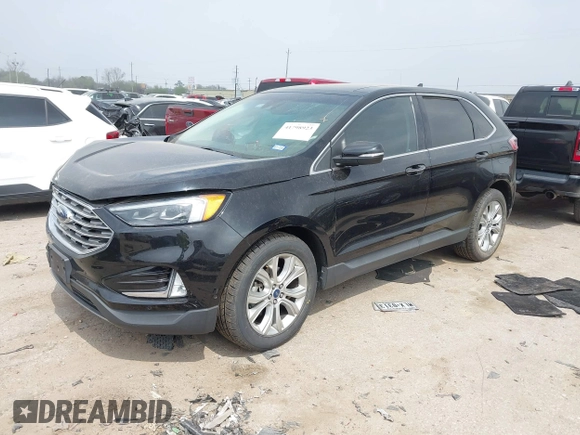 2019 Ford Edge Titanium z VIN 2FMPK3K91KBB95867, wystawiony jako IAAI lot #41798923 z przebiegiem 39 942 mil mil oraz . Historia ofert i sprzedaży dostępna na DreamBid. Obrazek 2.