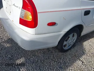 2002 Hyundai Accent GL with VIN KMHCG45C92U347708, listed as a IAAI auction lot 42137086 with 73,271 mi miles. Bid and sale history available at carsss.com. Image 14.