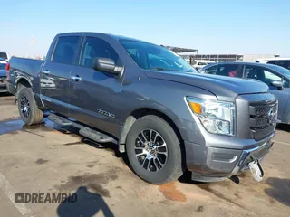 2021 Nissan Titan SV with VIN 1N6AA1EF2MN504611, listed as a IAAI auction lot 41469990 with 81,432 mi miles and . Bid and sale history available at DreamBid. Image 1.