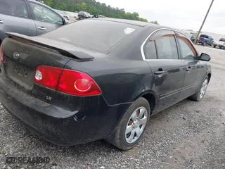 2008 Kia Optima LX with VIN KNAGE123885235142, listed as a IAAI auction lot 42112119 with 145,410 mi miles. Bid and sale history available at carsss.com. Image 4.