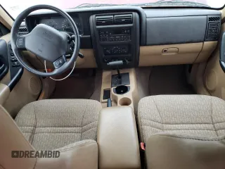 2000 Jeep Cherokee with VIN 1J4FT48S6YL200707, listed as a Copart auction lot 44689105 with 80,484 mi miles and Salvage title. Bid and sale history available at DreamBid. Image 8.