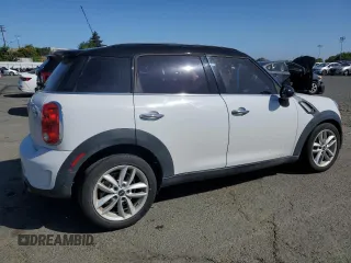 2014 MINI Countryman S with VIN WMWZC3C5XEWP25792, listed as a Copart auction lot 58583455 with 83,831 mi miles and Salvage title. Bid and sale history available at DreamBid. Image 3.