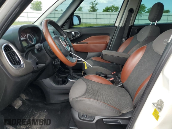 2014 FIAT 500L Trekking with VIN ZFBCFADH4EZ016712, listed as a Copart auction lot 71283484 with 127,058 mi miles and Salvage title. Bid and sale history available at DreamBid. Image 7.