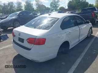 2012 Volkswagen Jetta SE z VIN 3VWDX7AJ7CM362001, wystawiony jako IAAI lot #42209146 z przebiegiem 200 566 mil mil oraz . Historia ofert i sprzedaży dostępna na DreamBid. Obrazek 4.