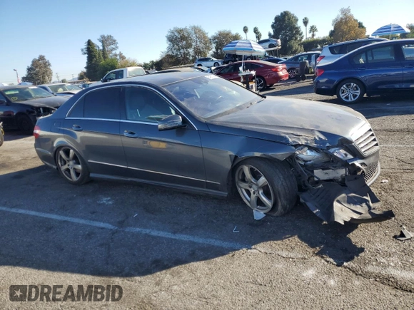 2011 Mercedes-Benz E 550 Luxury with VIN WDDHF7CBXBA307881, listed as a Copart auction lot 84961394 with 192,563 mi miles and Salvage Title. Bid and sale history available at DreamBid. Image 4.