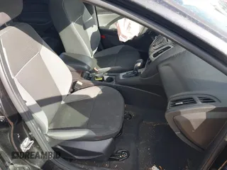 2013 Ford Focus SE z VIN 1FADP3F28DL312357, wystawiony jako IAAI lot #41798311 z przebiegiem 98 280 mil mil oraz . Historia ofert i sprzedaży dostępna na DreamBid. Obrazek 5.