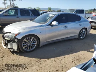 2019 Infiniti Q50 Luxe z VIN JN1EV7AP4KM543474, wystawiony jako Copart lot #52426585 z przebiegiem 50 435 mil mil oraz Szkody całkowita. Historia ofert i sprzedaży dostępna na DreamBid. Obrazek 1.