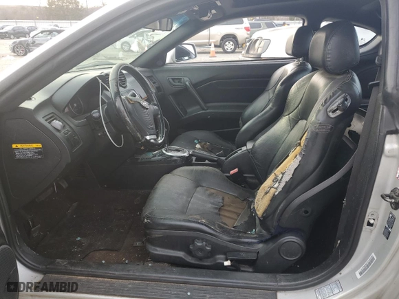 2003 Hyundai Tiburon GT with VIN KMHHN65F63U064962, listed as a Copart auction lot 44804045 with 186,171 mi miles and Salvage Title. Bid and sale history available at carsss.com. Image 7.