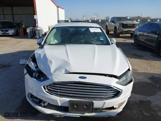 2018 Ford Fusion Hybrid SE with VIN 3FA6P0LU7JR188124, listed as a IAAI auction lot 41760184 with 74,731 mi miles. Bid and sale history available at carsss.com. Image 12.