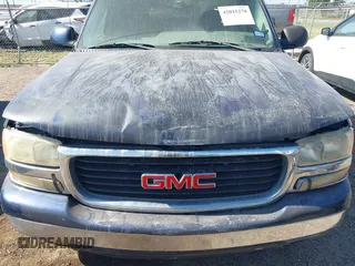 2003 GMC Yukon SLT with VIN 1GKEC13V13R212713, listed as a IAAI auction lot 42015270 with 1 mi miles. Bid and sale history available at carsss.com. Image 6.