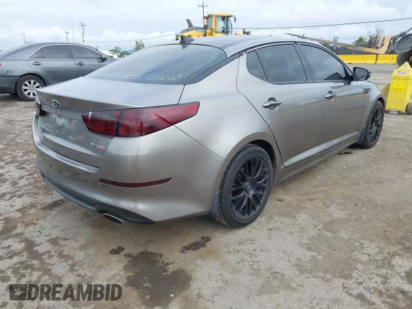 2015 Kia Optima EX with VIN 5XXGN4A7XFG423145, listed as a IAAI auction lot 42068943 with 113,730 mi miles and . Bid and sale history available at DreamBid. Image 4.