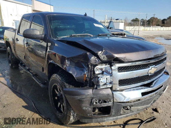2010 Chevrolet Silverado 1500 LT with VIN 3GCRCSE01AG129980, listed as a Copart auction lot 86322124 with 183,089 mi miles and Salvage Title. Bid and sale history available at DreamBid. Image 4.