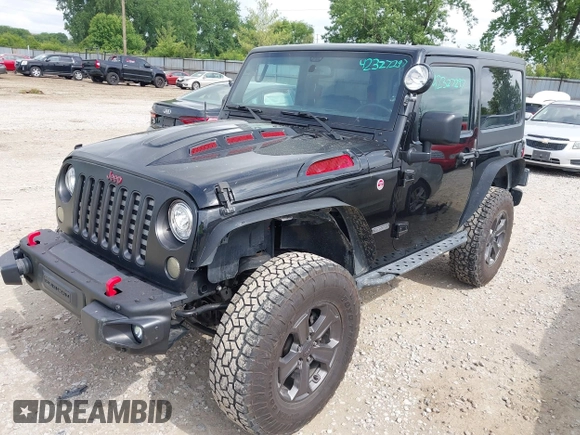 2018 Jeep Wrangler Rubicon Recon with VIN 1C4BJWCG6JL814834, listed as a IAAI auction lot 42327297 with 59,623 mi miles and . Bid and sale history available at DreamBid. Image 2.