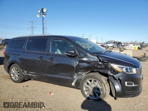 2021 Kia Sedona LX with VIN KNDMB5C1XM6671806, listed as a Copart auction lot 83027514 with 58,884 mi miles and Salvage Title. Bid and sale history available at carsss.com. Image 4.