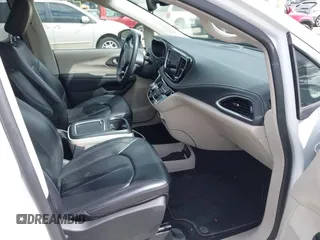 2023 Chrysler Pacifica Hybrid Touring L with VIN 2C4RC1L77PR541513, listed as a IAAI auction lot 42433421 with 53,979 mi miles and . Bid and sale history available at DreamBid. Image 5.
