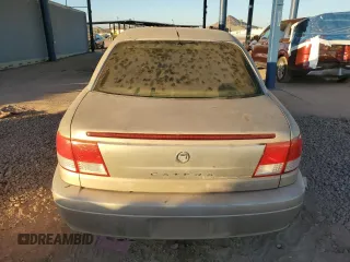 2000 Cadillac Catera z VIN W06VR54R5YR010954, wystawiony jako Copart lot #84863204 z przebiegiem 47 864 mil mil oraz Tytuł czysty. Historia ofert i sprzedaży dostępna na DreamBid. Obrazek 6.
