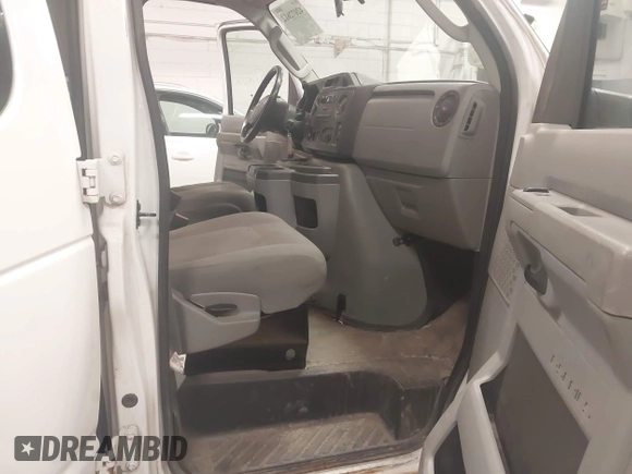 2012 Ford Econoline Cargo Recreational with VIN 1FTNE2EW4CDB03757, listed as a IAAI auction lot 42072612 with 147,153 mi miles. Bid and sale history available at carsss.com. Image 5.