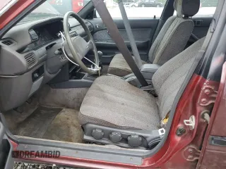 1989 Toyota Camry DLX z VIN 4T1SV21E1KU108151, wystawiony jako Copart lot #73657634 z przebiegiem 347 186 mil mil oraz Nie do naprawy • Non repairable. Historia ofert i sprzedaży dostępna na DreamBid. Obrazek 7.