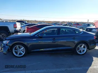 2018 Audi A5 Sportback Premium z VIN WAUDNCF52JA044291, wystawiony jako IAAI lot #41219360 z przebiegiem 86 273 mil mil oraz . Historia ofert i sprzedaży dostępna na DreamBid. Obrazek 14.