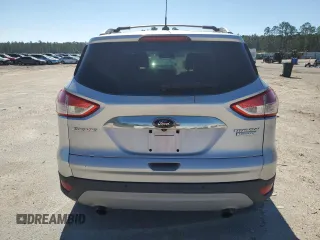 2014 Ford Escape Titanium with VIN 1FMCU0JX7EUE33971, listed as a Copart auction lot 45537205 with 94,733 mi miles and Salvage Title. Bid and sale history available at carsss.com. Image 6.