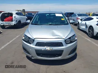 2014 Chevrolet Sonic LS with VIN 1G1JA6SH1E4135729, listed as a IAAI auction lot 42169273 with 74,969 mi miles and . Bid and sale history available at DreamBid. Image 12.