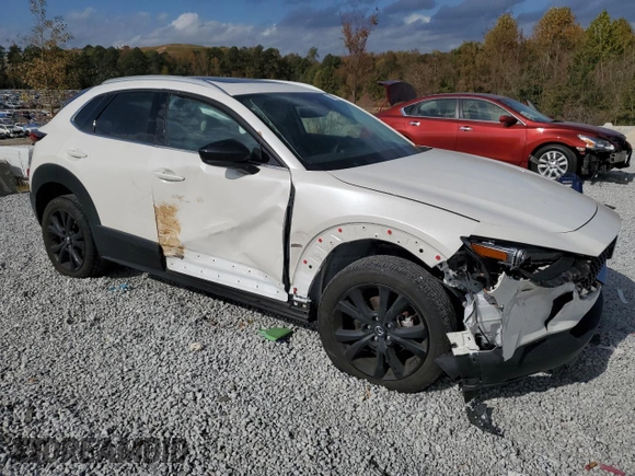 2023 Mazda CX-30 Premium with VIN 3MVDMBDY1PM510574, listed as a Copart auction lot 78449424 with 75,631 mi miles and Salvage title. Bid and sale history available at DreamBid. Image 4.