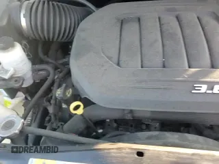 2018 Dodge Grand Caravan SE Plus с VIN 2C4RDGBG3JR190771, выставлен на аукционе Copart как лот 82398495 с пробегом 68 650 миль миль и Списание • Salvage title. История ставок и продаж доступна на DreamBid. Изображение 14.