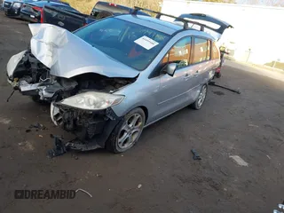 2008 Mazda 5 Grand Touring z VIN JM1CR29L380326026, wystawiony jako IAAI lot #41499108 z przebiegiem 259 220 mil mil oraz . Historia ofert i sprzedaży dostępna na DreamBid. Obrazek 2.