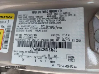 2015 Ford Fusion SE Hybrid z VIN 3FA6P0LU3FR163695, wystawiony jako IAAI lot #42428393 z przebiegiem 237 835 mil mil oraz . Historia ofert i sprzedaży dostępna na DreamBid. Obrazek 9.