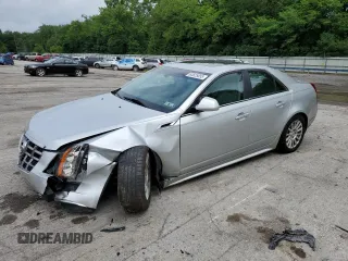 2012 Cadillac CTS Luxury z VIN 1G6DG5E59C0122894, wystawiony jako Copart lot #63825855 z przebiegiem 77 007 mil mil oraz Szkoda całkowita • Salvage title. Historia ofert i sprzedaży dostępna na DreamBid. Obrazek 1.